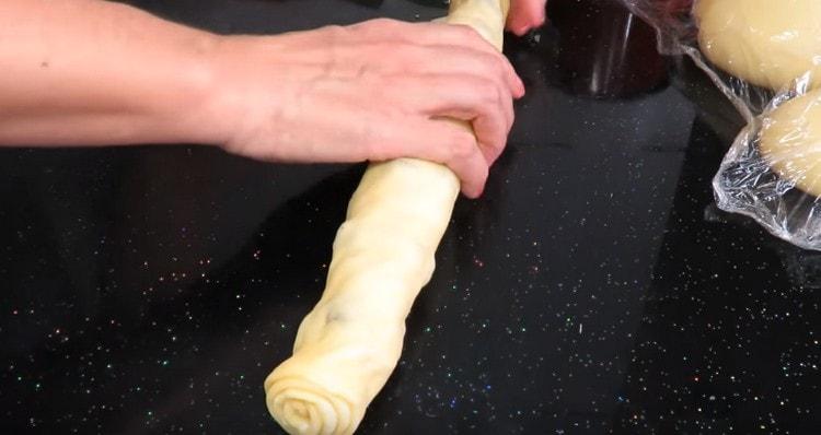 Gently twist the dough into a tight roll.