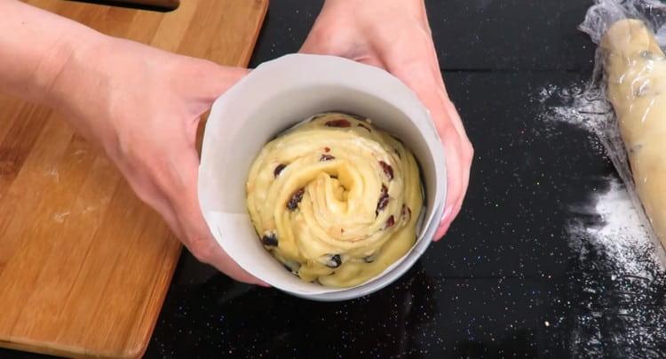 The formed Easter cake is put into shape and sent to the oven.