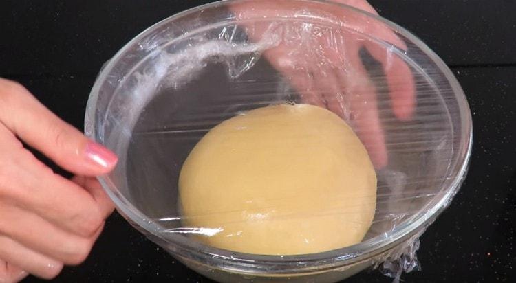 Put the dough in a bowl, cover with cling film and let it rise.