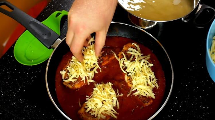 Sprinkle each piece of fillet with grated cheese.
