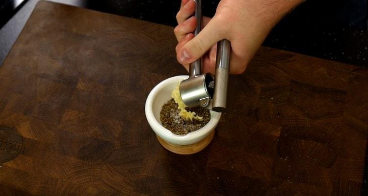 Squeeze the garlic into the marinade.