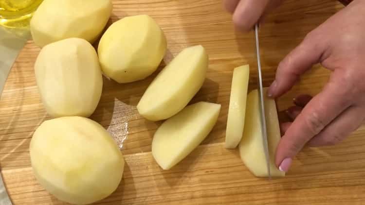Chop potatoes for cooking