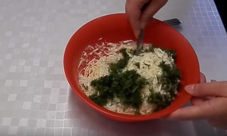 Then add the grated cheese and chopped greens.