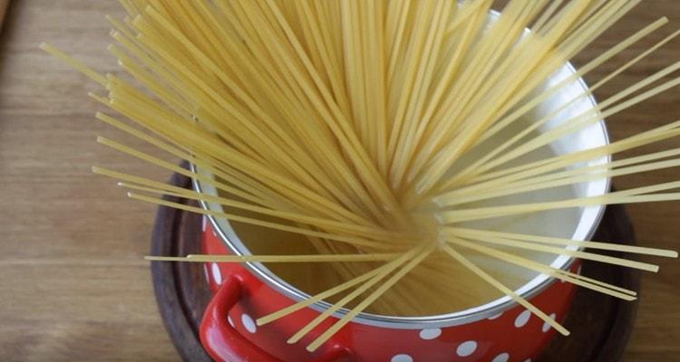 We boil water, put spaghetti in it.