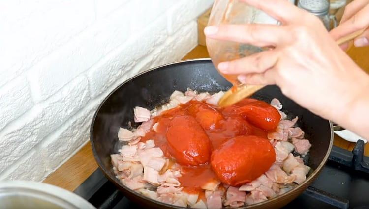 Add the tomatoes in our own juice.