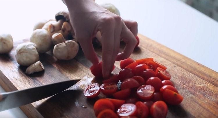 Cut the cherry tomatoes.