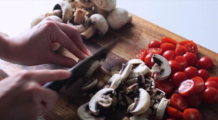 We cut champignons with plates.