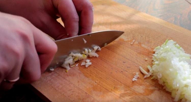 Grind the garlic.