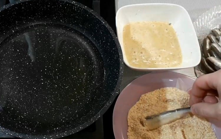Dip each fish in egg mass, and then roll in breadcrumbs.