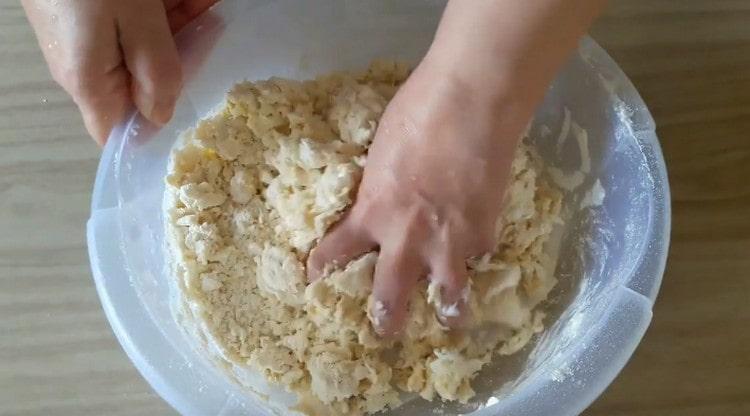 Rub the dough with your hands.