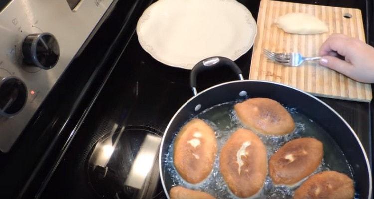 Fry pies on both sides.