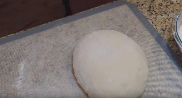 the dough should rise again a little.