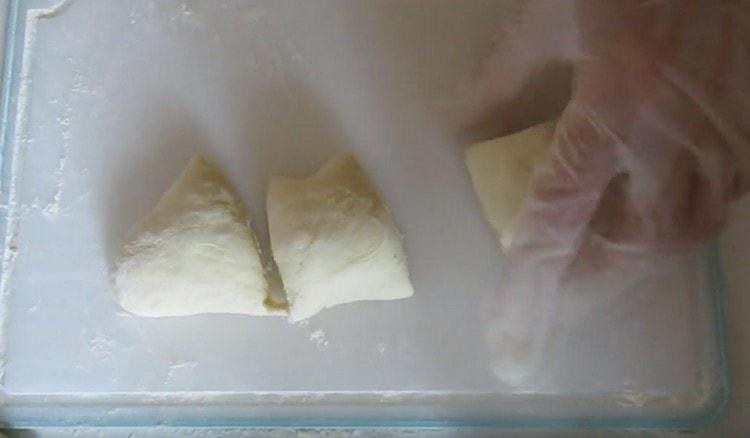 Divide the dough into portioned pieces.