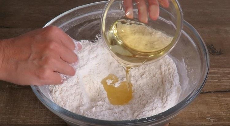 Add vegetable oil to flour and salt.