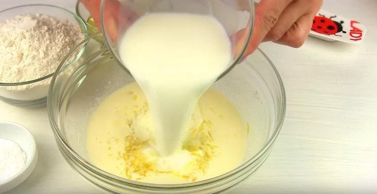 We introduce milk into the components in the bowl.