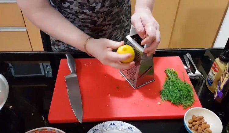 Rub the zest of lemon on the finest grater.