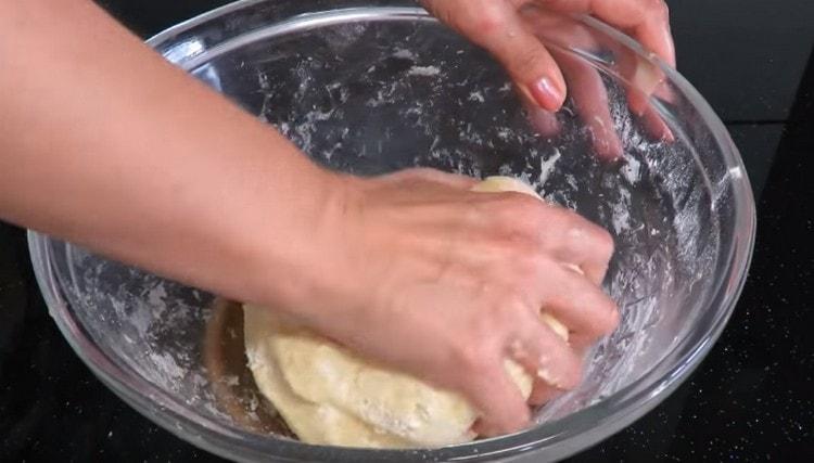 Knead the soft dough.