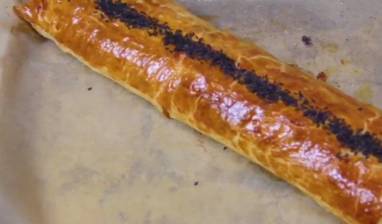 Fragrant roll of puff pastry ready.