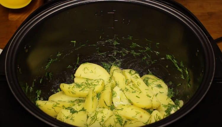 Mix the potatoes so that the greens and butter are evenly distributed.