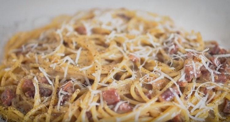When serving spaghetti with bacon, you can sprinkle with parmesan.