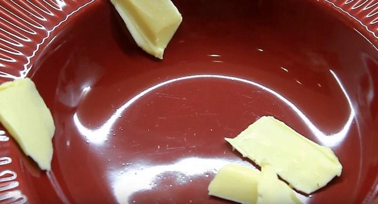 Put a few slices of butter on a serving dish.