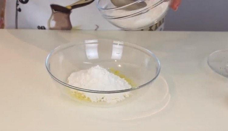 Add the flour to the lemon zest.