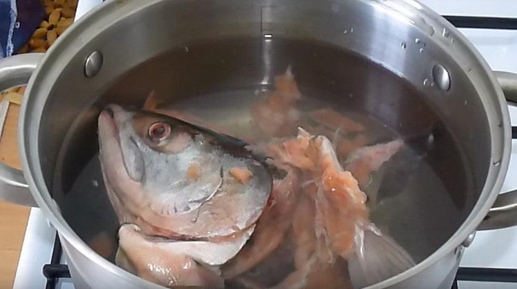 We put the fish in a saucepan to cook.