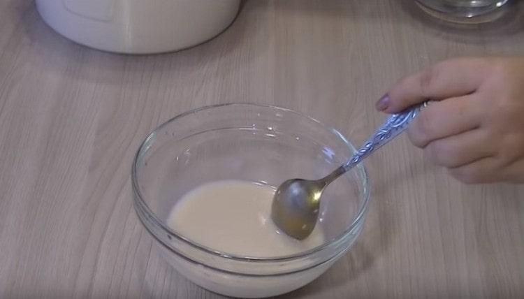 Mix yeast with sugar and water.