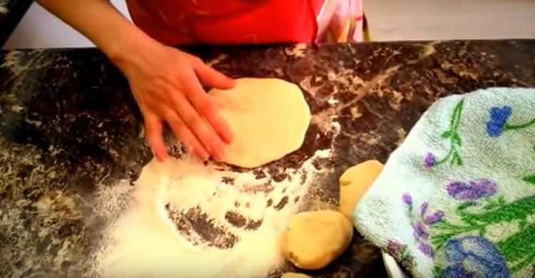 Each piece of dough can be rolled and pies formed.
