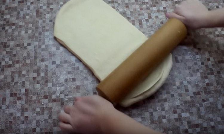 Roll out the resulting square with a rolling pin.
