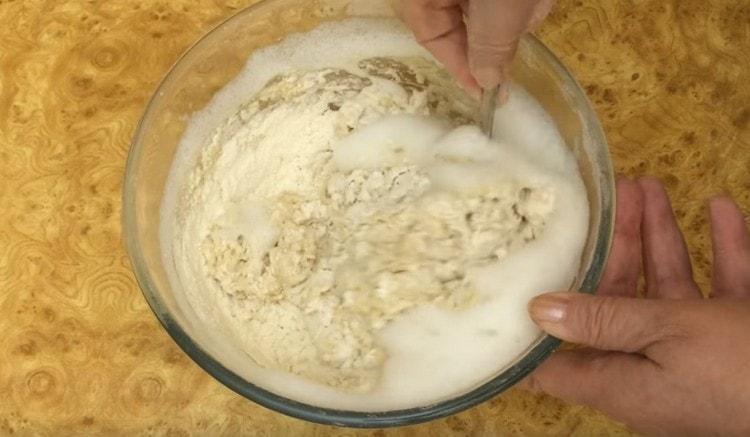 Gently mix the dough.