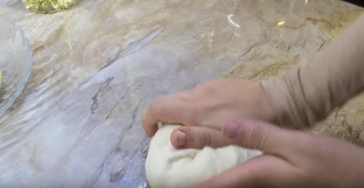 Thoroughly knead a homogeneous elastic dough.