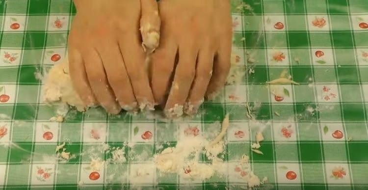 Next, knead the dough with your hands.