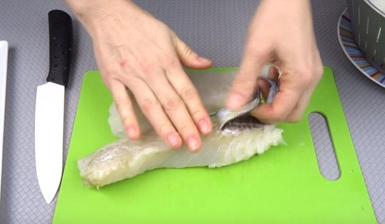 Remove the skin from the fillet.