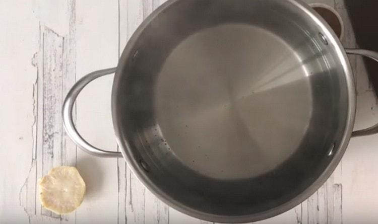 In a saucepan, bring the water to a boil.