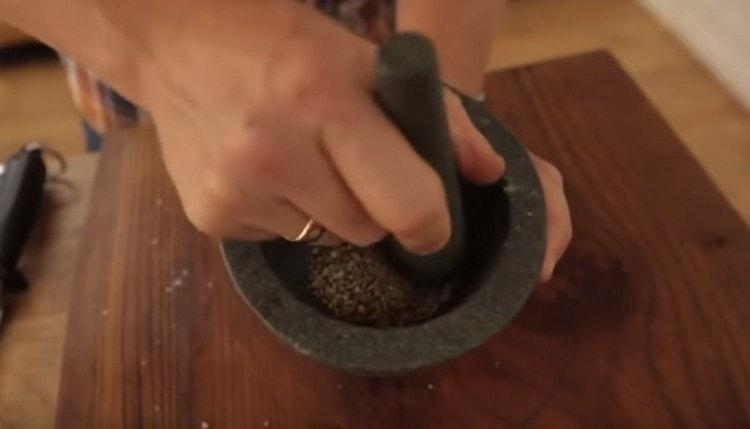 Grind spices in a mortar.