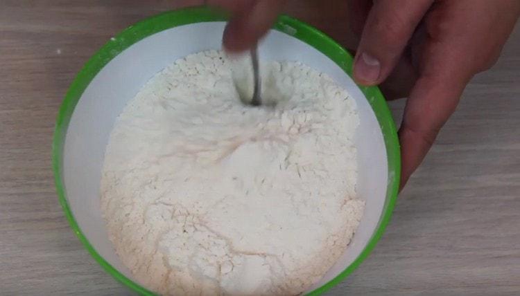 Combine flour with baking powder.