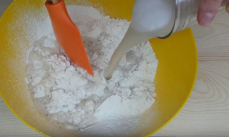 Add the yeast mixture to the sifted flour.