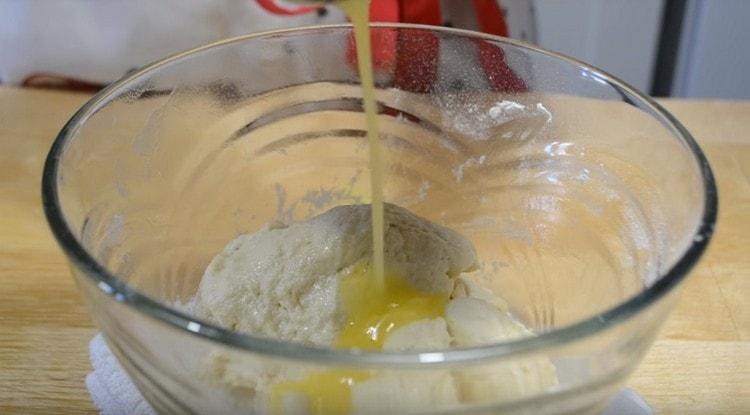 Add the melted butter to the dough.