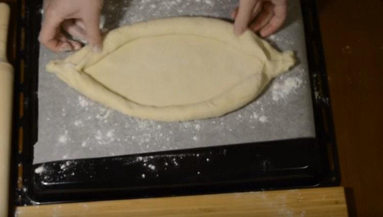 Nous déplaçons le blanc et la casserole recouverte de parchemin.