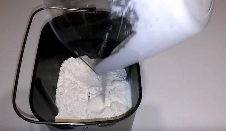 Kefir with soda is added to the flour.