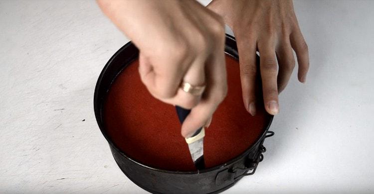 Carefully separate the finished dessert with a knife from the sides of the form and remove them.