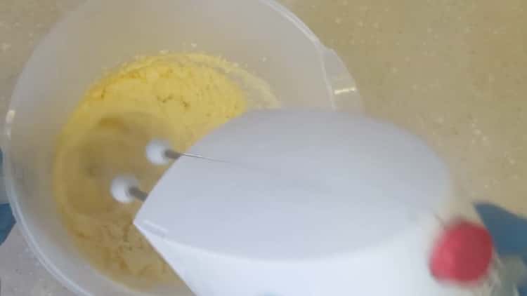 Mix the ingredients to make banana cupcakes.