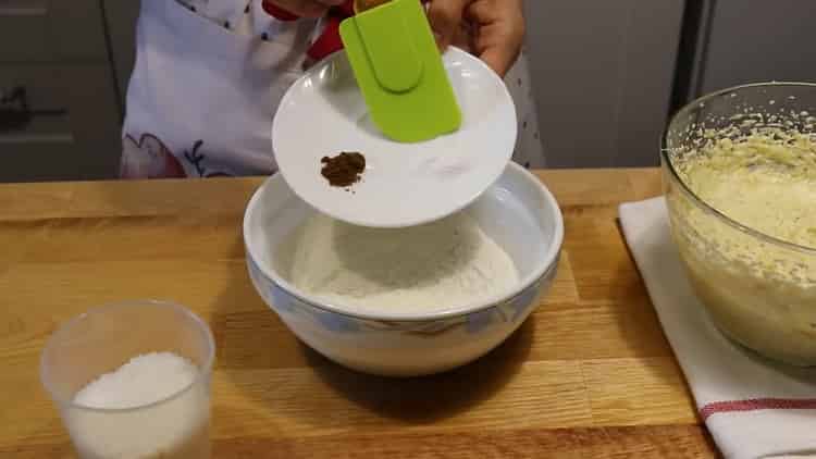 Mix dry ingredients to make a banana cake.