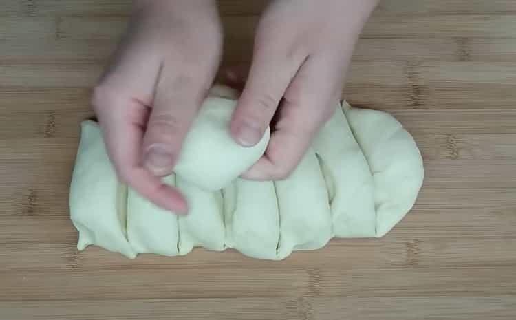 To make buns, cut the dough