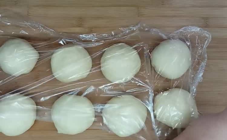 To make buns, place the dough under the film