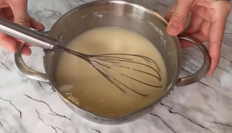 To make the custard yeast buns, add milk