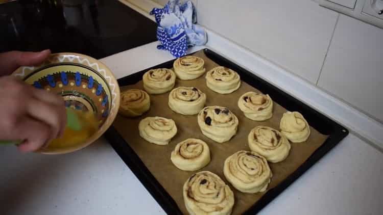 For cooking cinnamon rolls from puff pastry, grease the blanks with an egg