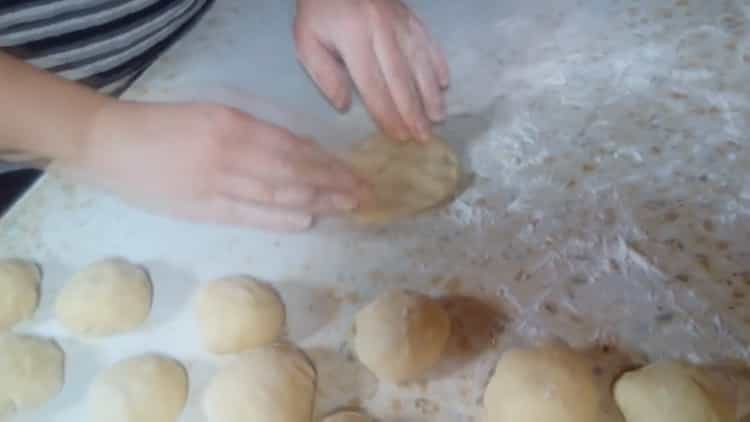 Roll dough to make jam rolls
