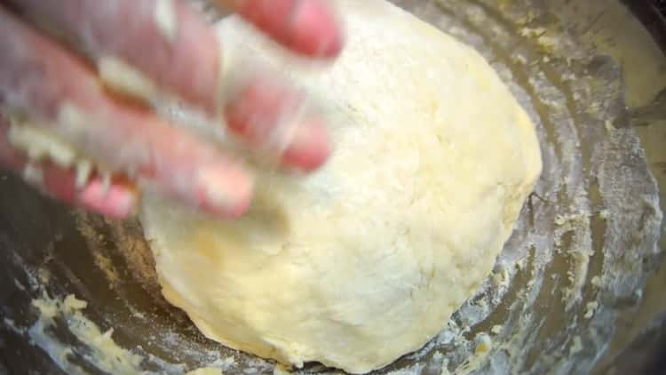 Knead the dough to make apple booths